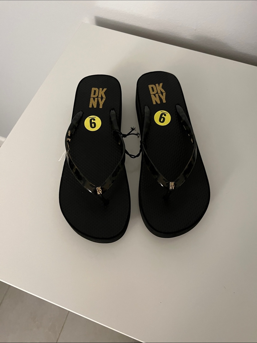 DKNY wedge flip flops